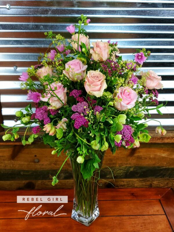 12 (1 Dozen) Peach Roses Elegantly arranged in a tall Glass vase with fresh accents and greens