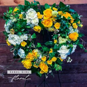 Yellow and White Florals in a open Heart Shaped Wreath